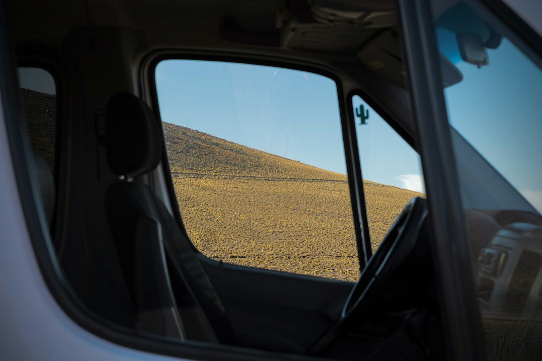 Looking out through the window of a small campervan